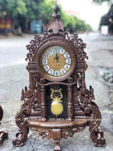 đồng hồ để bàn gỗ mun đuôi công